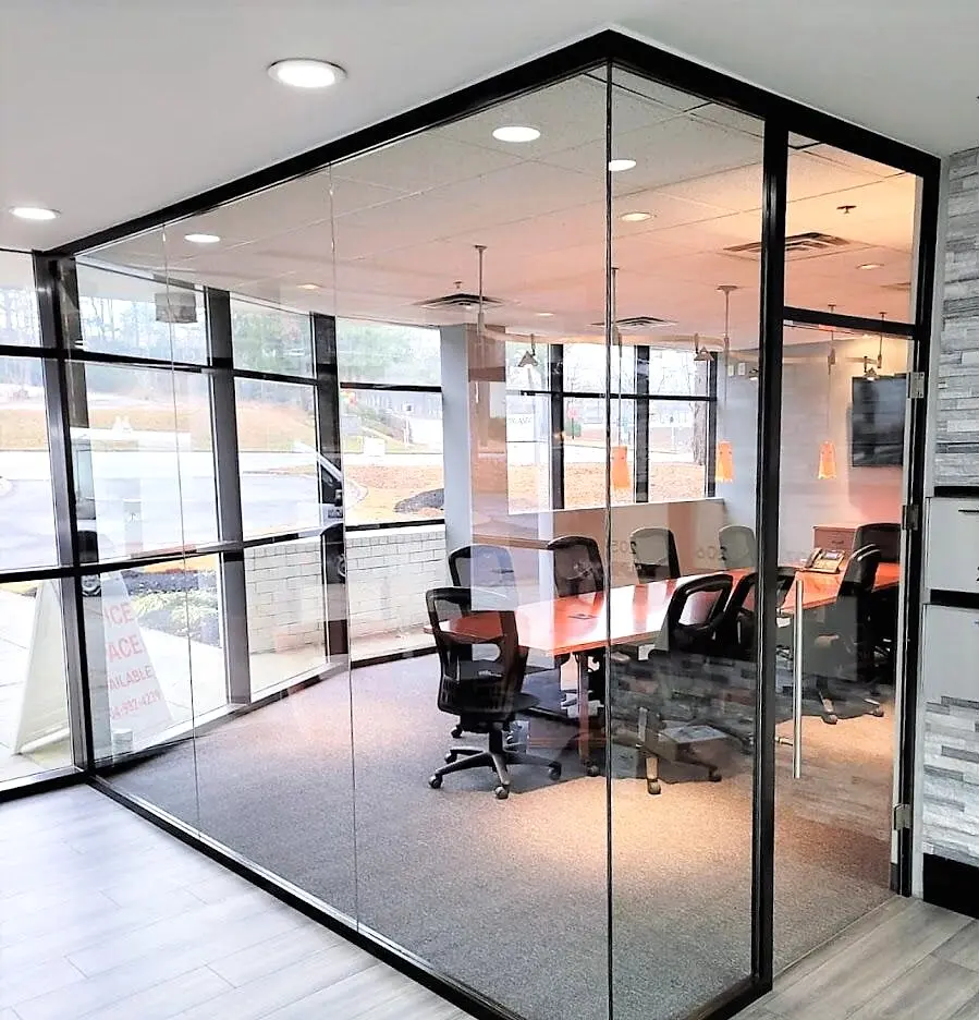 Black-framed glass conference-room enclosure
